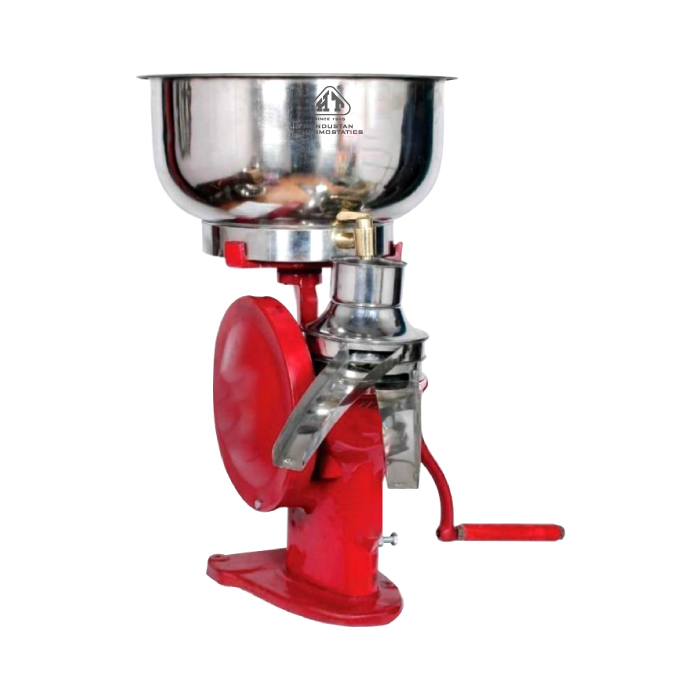 A vibrant red, hand-operated cream separator with a shiny stainless steel bowl on top. It features a visible crank handle for manual operation, a disc mechanism, and a spout for separated cream or milk.