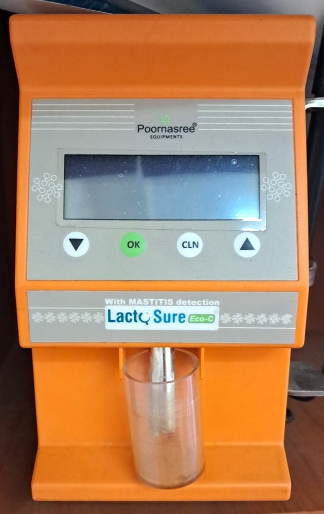 A bright orange and grey "LactoSure Eco C" milk analyzer, featuring a digital display, "OK" and "CLN" buttons, and a clear glass for milk samples.