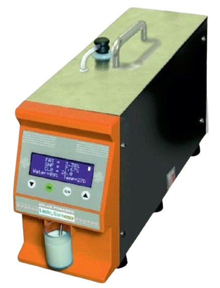 A compact, solar-powered "Lactosure Eco S" ultrasonic milk analyzer. The device has an orange and black casing with a digital display showing "FAT," "SNF," "CLR," and "Water."