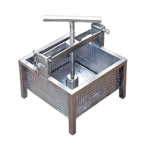 A manual paneer press machine made of stainless steel. It features a perforated rectangular box with a screw press mechanism on top, used for pressing curd to make paneer.