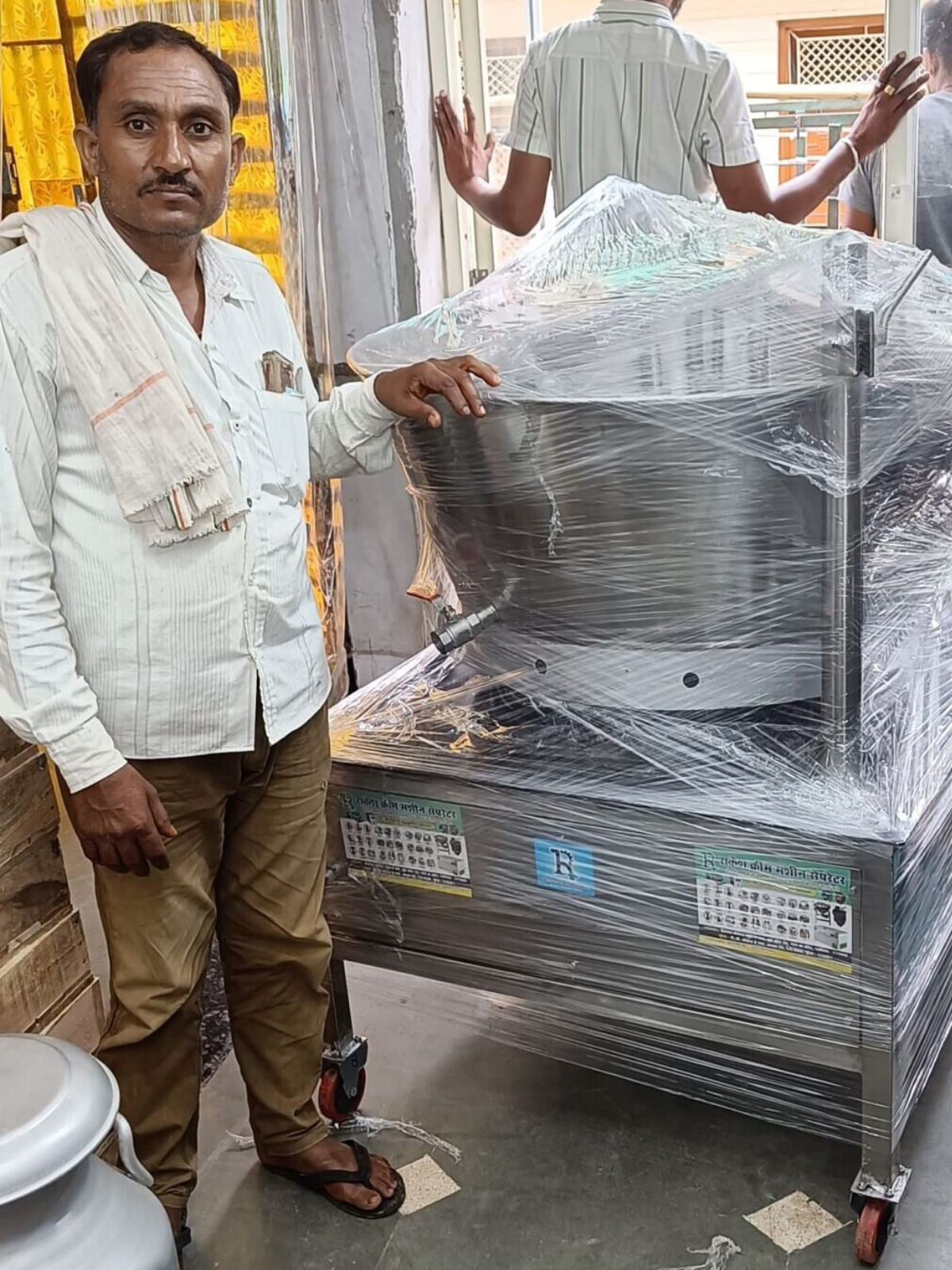 A man representing a client of Rakesh Cream Machine Separator.